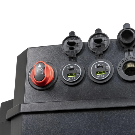 Hardkorr Battery Box Pro top corner with open USB and socket covers.