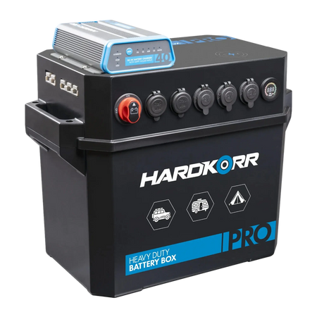 Hardkorr Battery Box Pro with DCDC Charger front-left view with sockets and charger.