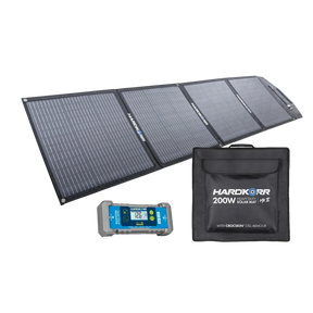 Hardkorr MKII 200W solar mat unfolded beside its carry bag and 15A solar regulator.