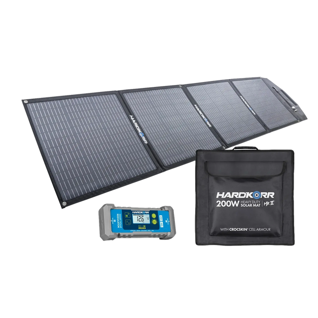 Hardkorr MKII 200W solar mat unfolded beside its carry bag and 15A solar regulator.