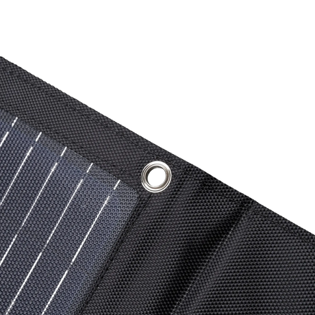 Hardkorr MKII 200W solar mat corner close up with a metal eyelet beside the solar cells.