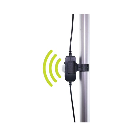 Hardkorr motion sensor for LED light bars mounted on a pole with green motion detection symbols.
