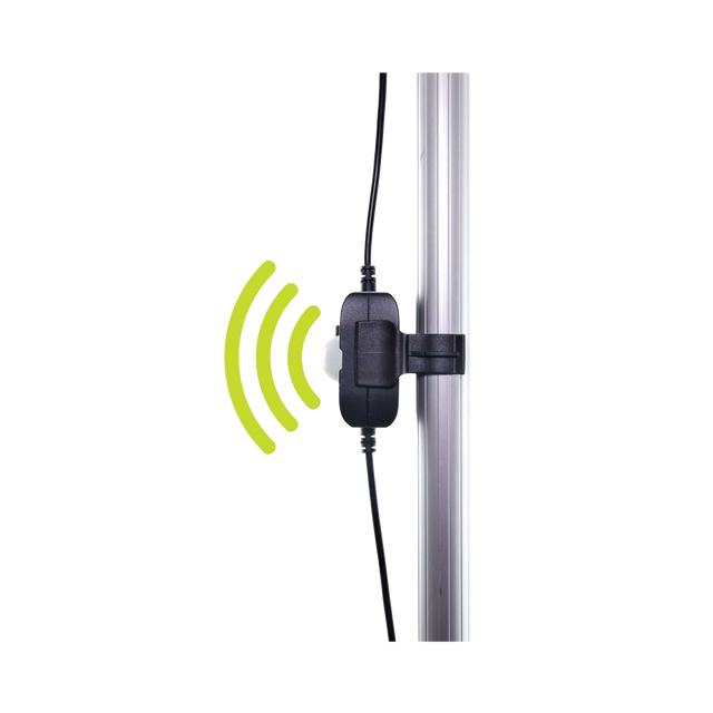 Hardkorr motion sensor for LED light bars mounted on a pole with green motion detection symbols.