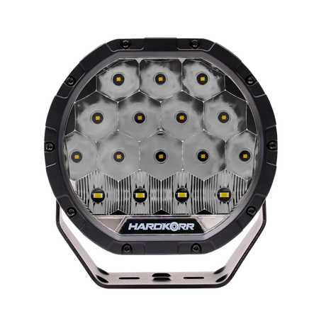 Hardkorr XD Series 7 inch LED driving light front view with round reflectors above a row of smaller LEDs.