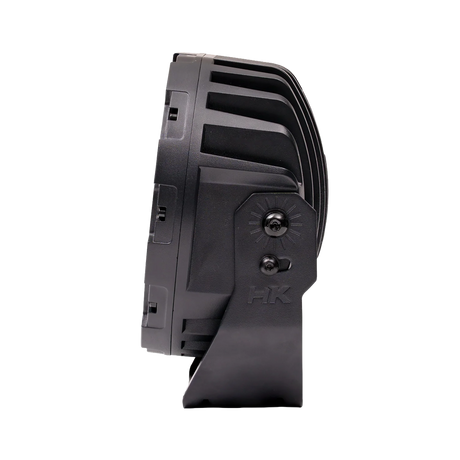 Hardkorr XD Series 7 inch LED driving light side view with cooling fins and bracket bolts.
