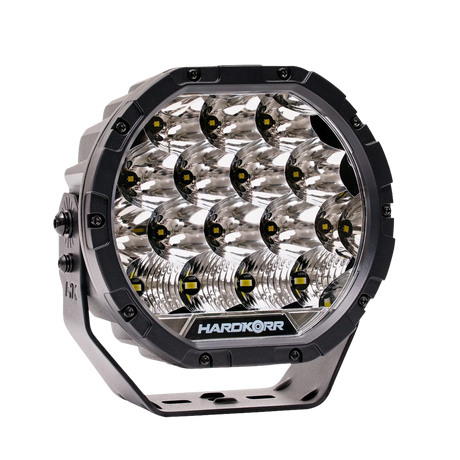 Hardkorr XD Series 7 inch LED driving light in a front left view with black bezel and silver bracket.
