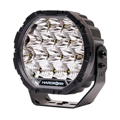 Hardkorr XD Series 7 inch LED driving light in a front right view with reflectors and mounting bracket.
