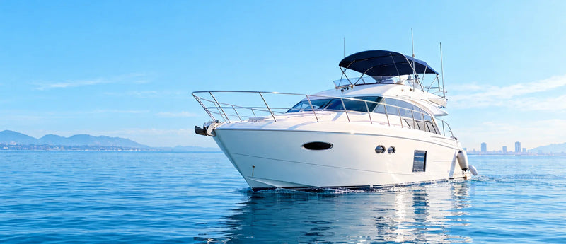 White motor cruiser on calm blue water