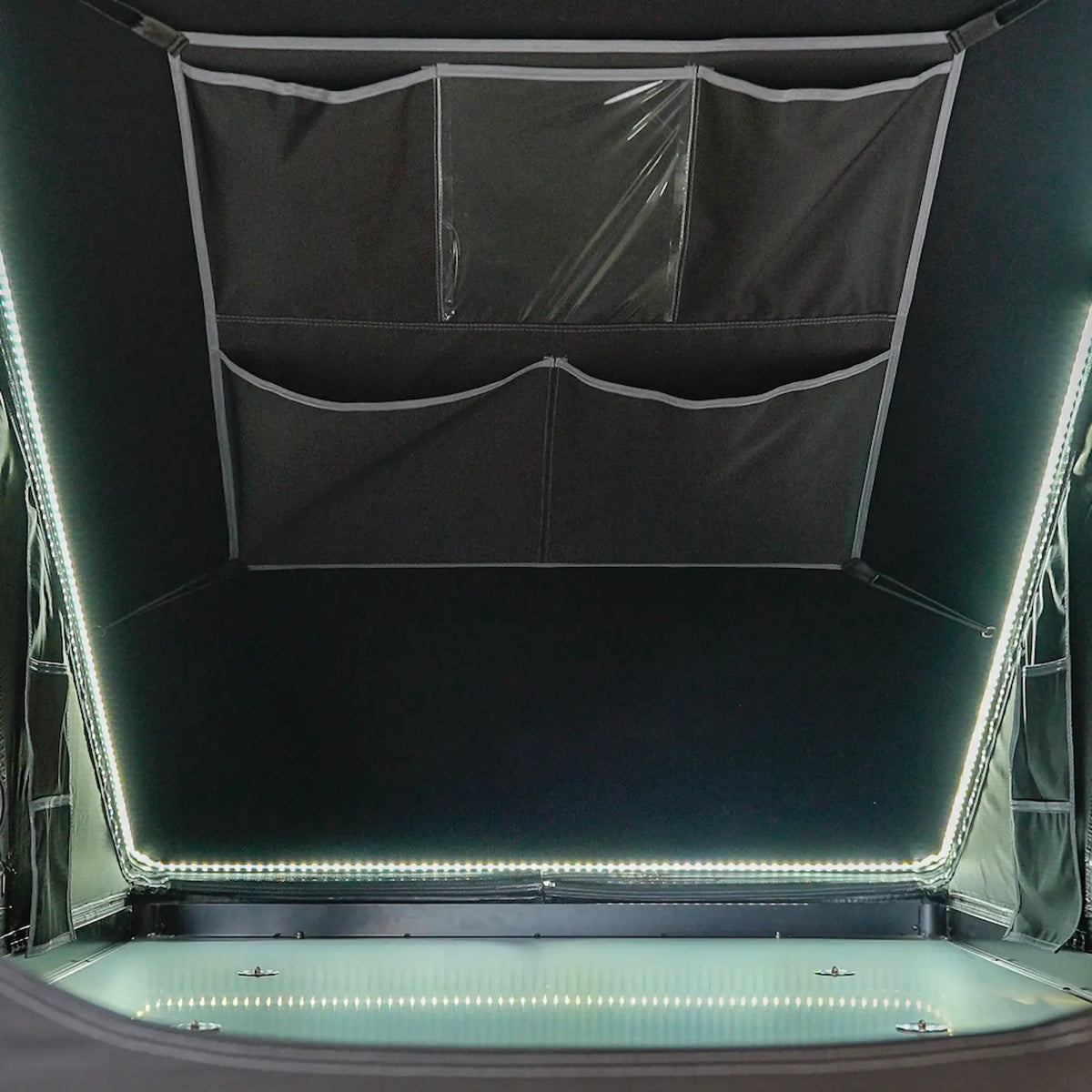 Outback Tourer 1.2 Carbon Fibre Rooftop Tent interior storage pockets above the mattress.