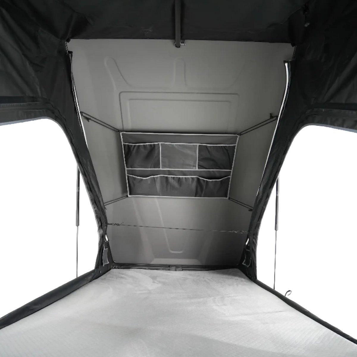 Outback Tourer 1.3 ST Rooftop Tent interior view with mattress and storage pockets.