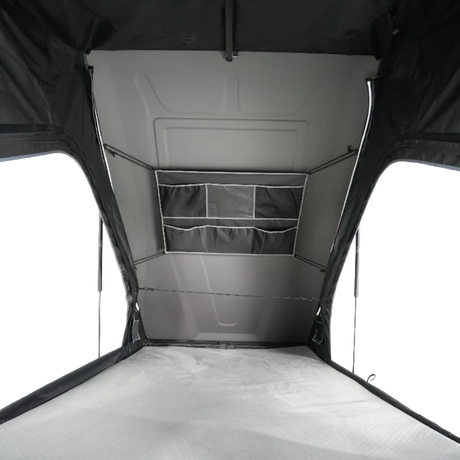 Outback Tourer 1.3 ST Rooftop Tent interior view with mattress and storage pockets.