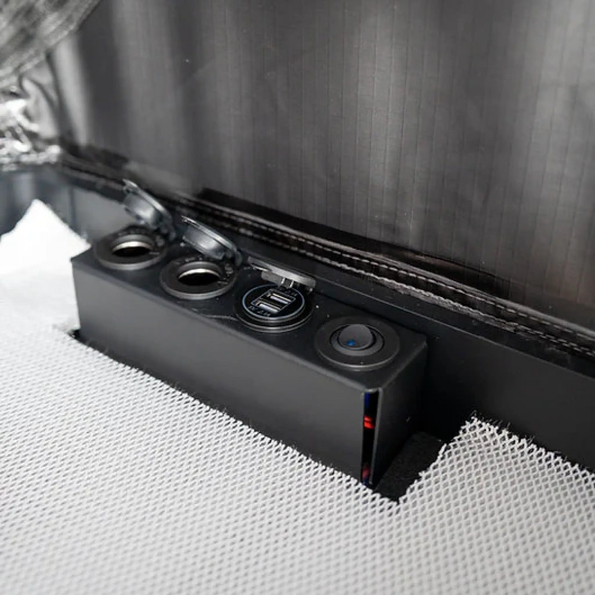 Outback Tourer 1.4 Rooftop Tent interior power panel with switches and sockets.