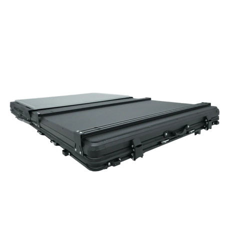 Outback Tourer 1.4 X Rooftop Tent closed shell with cross bars on top.