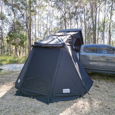 Outback Tourer 1.5 Lite Annex closed front view attached to a ute in a bush campsite.