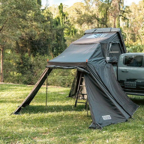 Outback Tourer 1.5 Lite Annex front-left view with side canopy open and ladder visible.