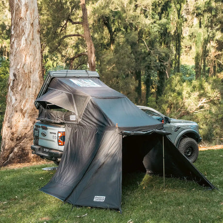 Outback Tourer 1.5 Lite Annex open-left view with side entry canopy behind the ute.