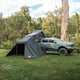 Outback Tourer 1.5 Lite Annex open-right view attached to a ute in a wooded campsite.