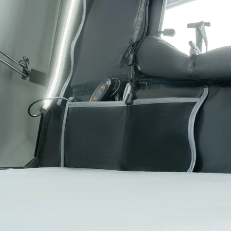 Outback Tourer 1.5 Lite Rooftop Tent interior organiser pocket beside the mattress.