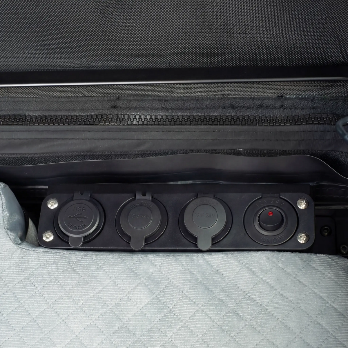 Outback Tourer 1.5 Lite Rooftop Tent interior power panel beside the mattress.