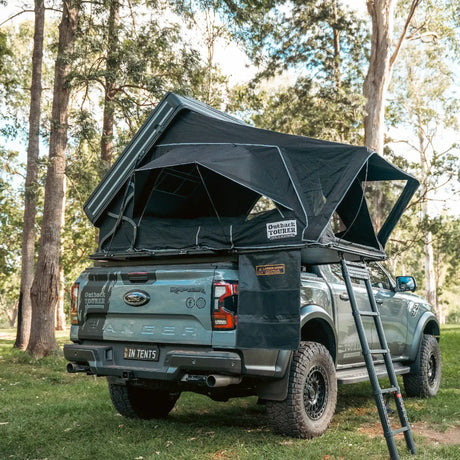 Outback Tourer 1.5 Pro Rooftop Tent back open view with ladder on a grey ute.