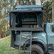 Outback Tourer 1.5 Pro Rooftop Tent open view with ladder pulled out on a grey ute.