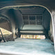 Outback Tourer 1.5 Pro Rooftop Tent interior view with mattress, LED light and windows open.