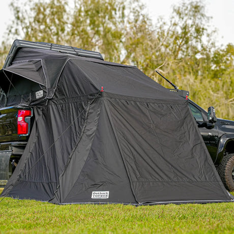 Outback Tourer 1.9 Pro Annex front left view with side wall closed.
