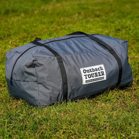 Outback Tourer 180 Full Wall Kit packed in its grey carry bag on grass.