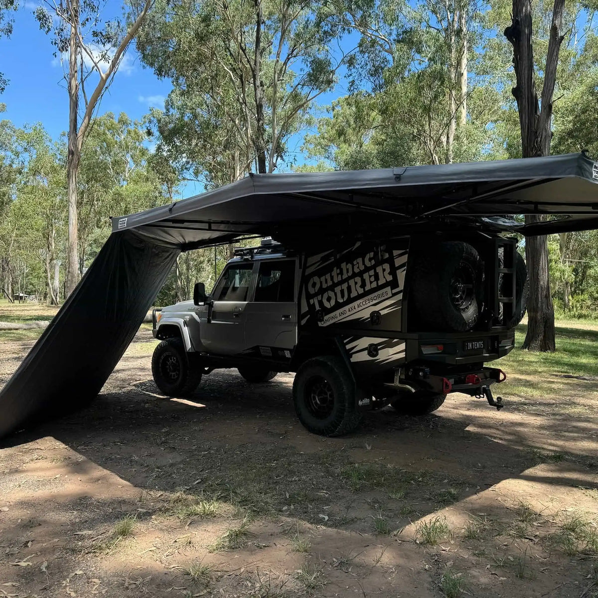 Outback Tourer 2.8 Metre Wall left side view under an awning beside a 79 Cruiser.