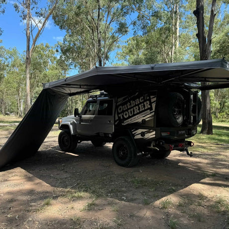 Outback Tourer 2.8 Metre Wall left side view under an awning beside a 79 Cruiser.