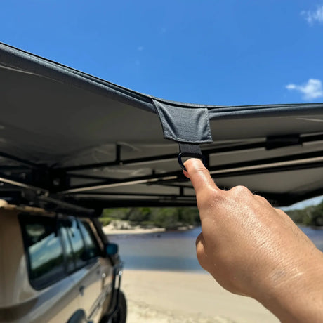 Outback Tourer Drivers Side 270 Awning tie down hook for rain on the awning edge.