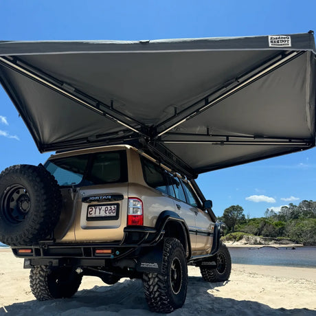 Outback Tourer Drivers Side 270 Awning rear underside installed on a Nissan Patrol on the beach.