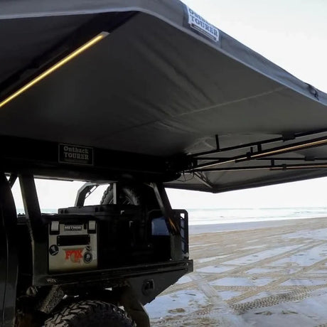 Outback Tourer Drivers Side 270 Plus Awning underside support frame view with tailgate storage below.