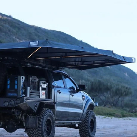 Outback Tourer Drivers Side 270 Plus Awning side underside view on a ute canopy near the dunes on the beach.
