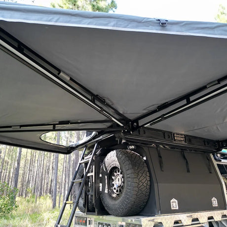 Outback Tourer Drivers Side 270 Plus with D Zipper Awning underside with the view of a ladder and D Zip opening.