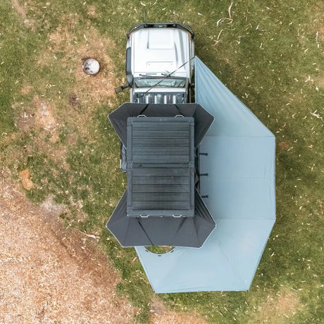 Outback Tourer Drivers Side 270 Plus with D Zipper Awning overhead view with solar panels and side awnings from a tent.