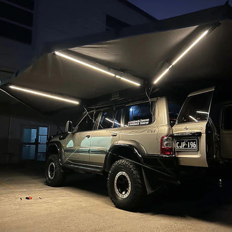 Outback Tourer Passenger Side 270 Plus Awning underside view with three led strips turned on.