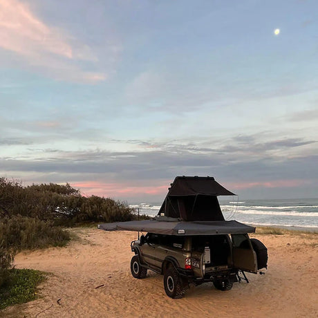 Outback Tourer Passenger Side 270 Plus Awning wide beach view with rooftop tent and 270 awning open.