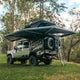 Outback Tourer Passenger Side 270 Plus with D Zipper Awning rear left view with ladder on a 79 Landcruiser