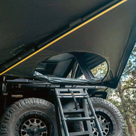 Outback Tourer Passenger Side 270 Plus with D Zipper Awning close up of D-shaped opening and rolled canvas.