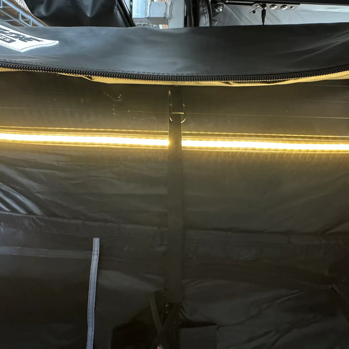 Outback Tourer Shower Awning interior LED light strip turned on.