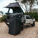 Outback Tourer Shower Awning right side view with a rooftop tent opened.