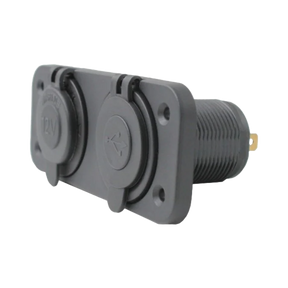 Rekcharge 12V cigarette lighter and twin USB panel in a front right view with both caps closed.