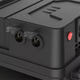 Rekcharge 12V portable battery box side close up with two round sockets and their protective caps open.