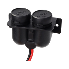 Rekcharge 12V twin cigarette lighter sockets viewed from above with both caps closed and leads exiting below.