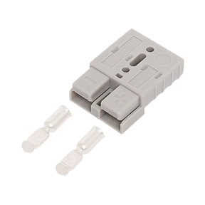 Rekcharge grey 50A Anderson plug housing with two metal crimp contacts placed beside it.
