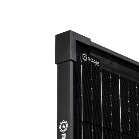 Roam Gear 250W 12V slimline black glass solar panel corner cap and branded side frame close up.