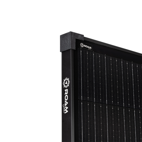 Roam Gear 300W 12V black glass solar panel corner cap with an embossed emblem and branded frame.