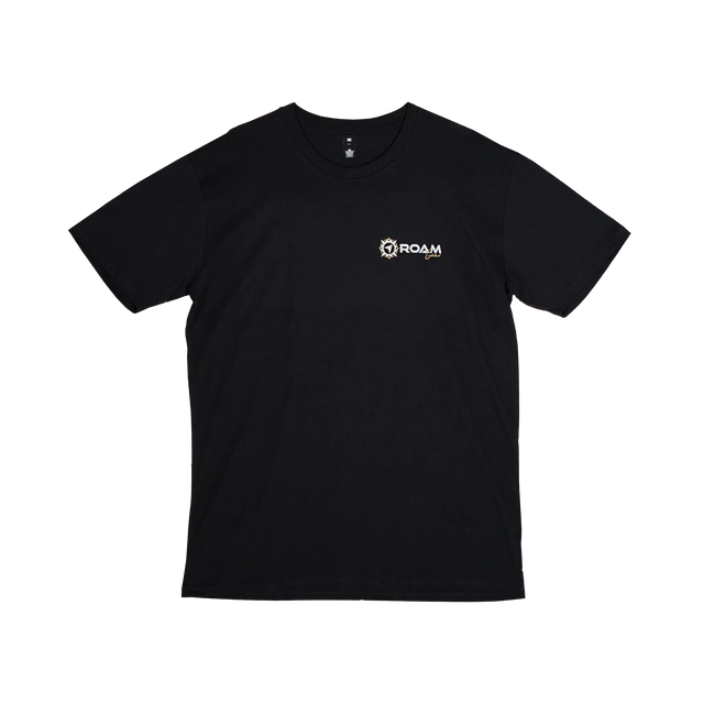 Roam Gear "Live the Roam Life" male black T-shirt front view with a small white and gold chest logo.
