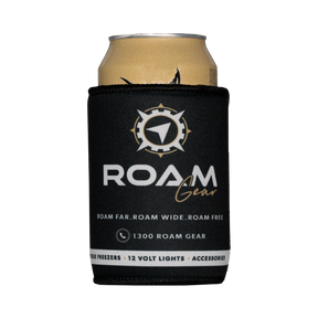 Roam Gear black stubby cooler front view around a can, with the white and gold logo facing forward.